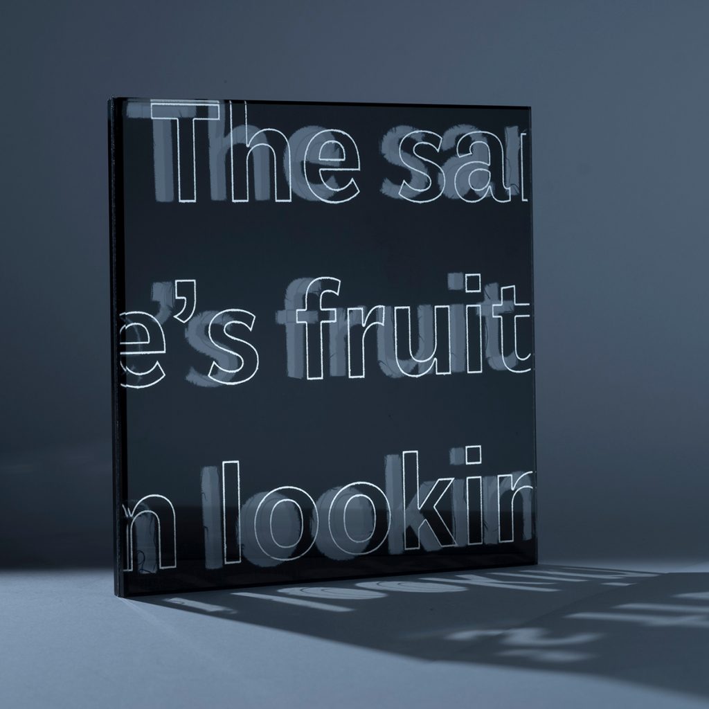 Black Perforated Text Mirror