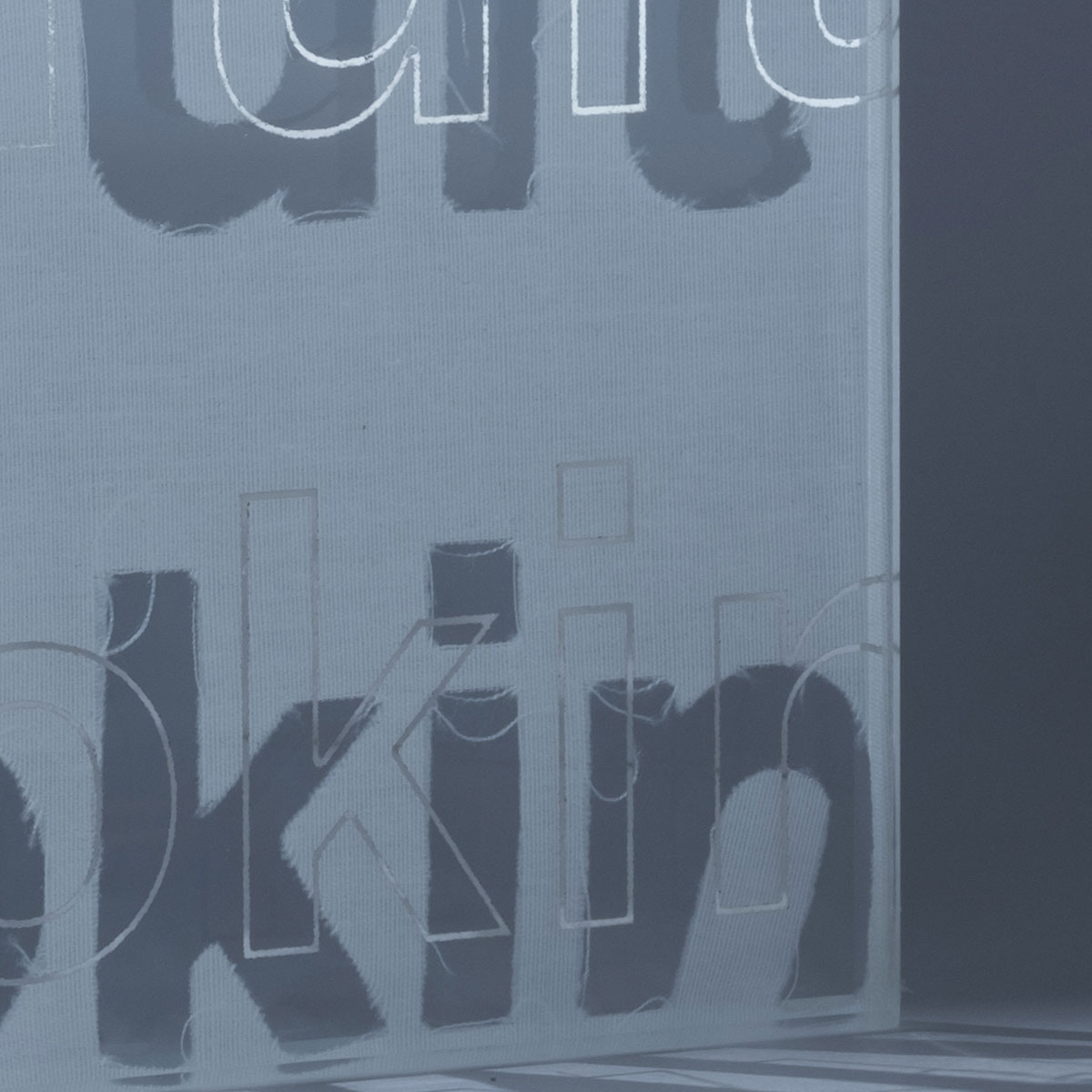 White Perforated Text Mirror